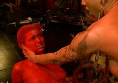 Babe colored in red fucked hard by tranny