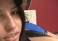 This sexy latina biker tranny wanks her cock off